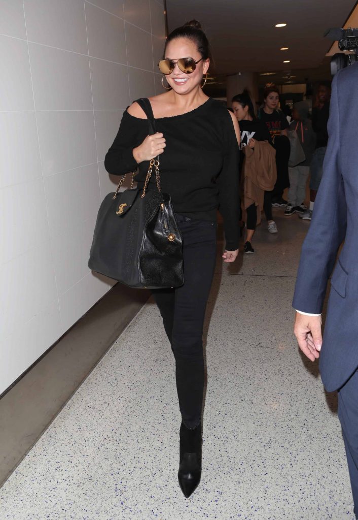 Chrissy Teigen's Cold Shoulder Sweater Look for Less!