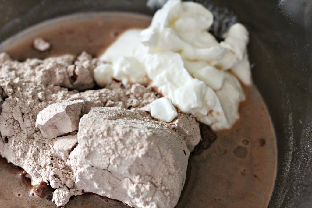 Step by Step: Start combining all ingredients in a large mixing bowl. Mix with a hand mixture until well combined. Pour into a 9x9 or 8x8 square greased baking pan. Bake according to box instructions. Let cool and cut into 9 squares. Serve and enjoy! 