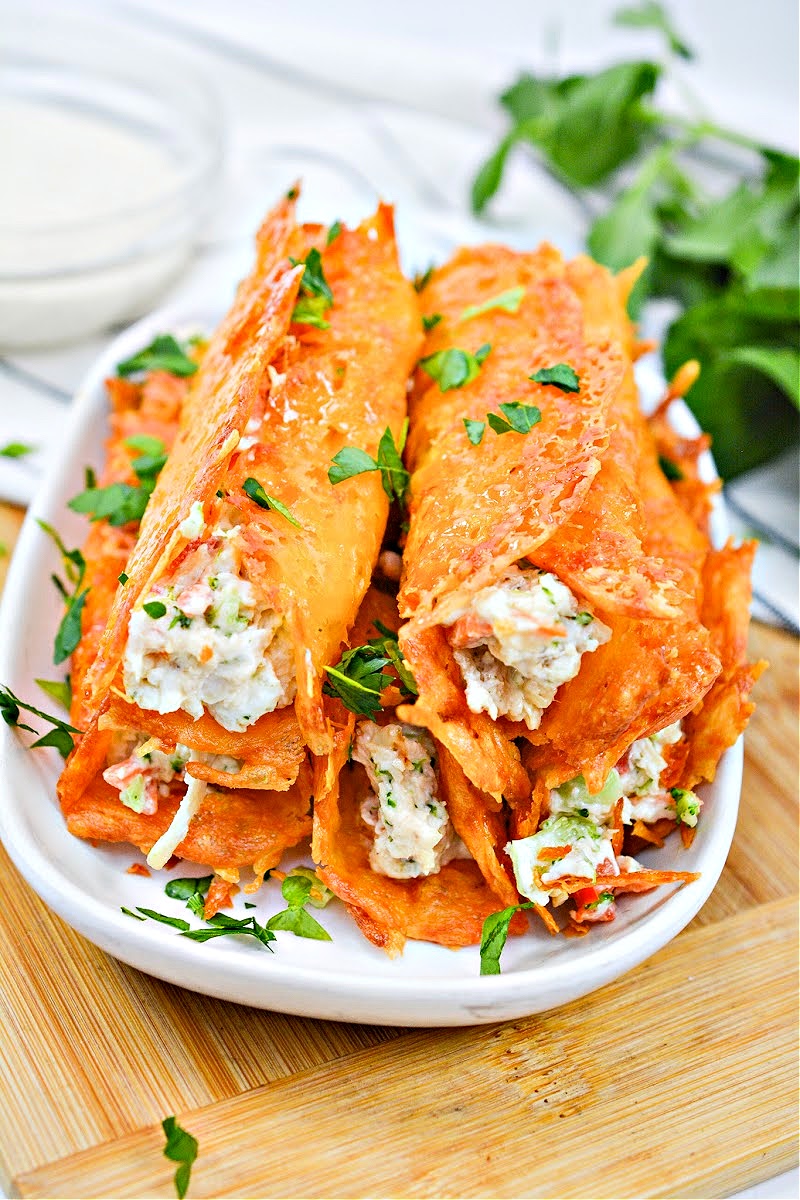 A serving plate of five Keto Ranch Cream Cheese Chicken and Veggies Roll Ups