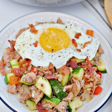 Keto Zucchini Breakfast Hash with an egg on top