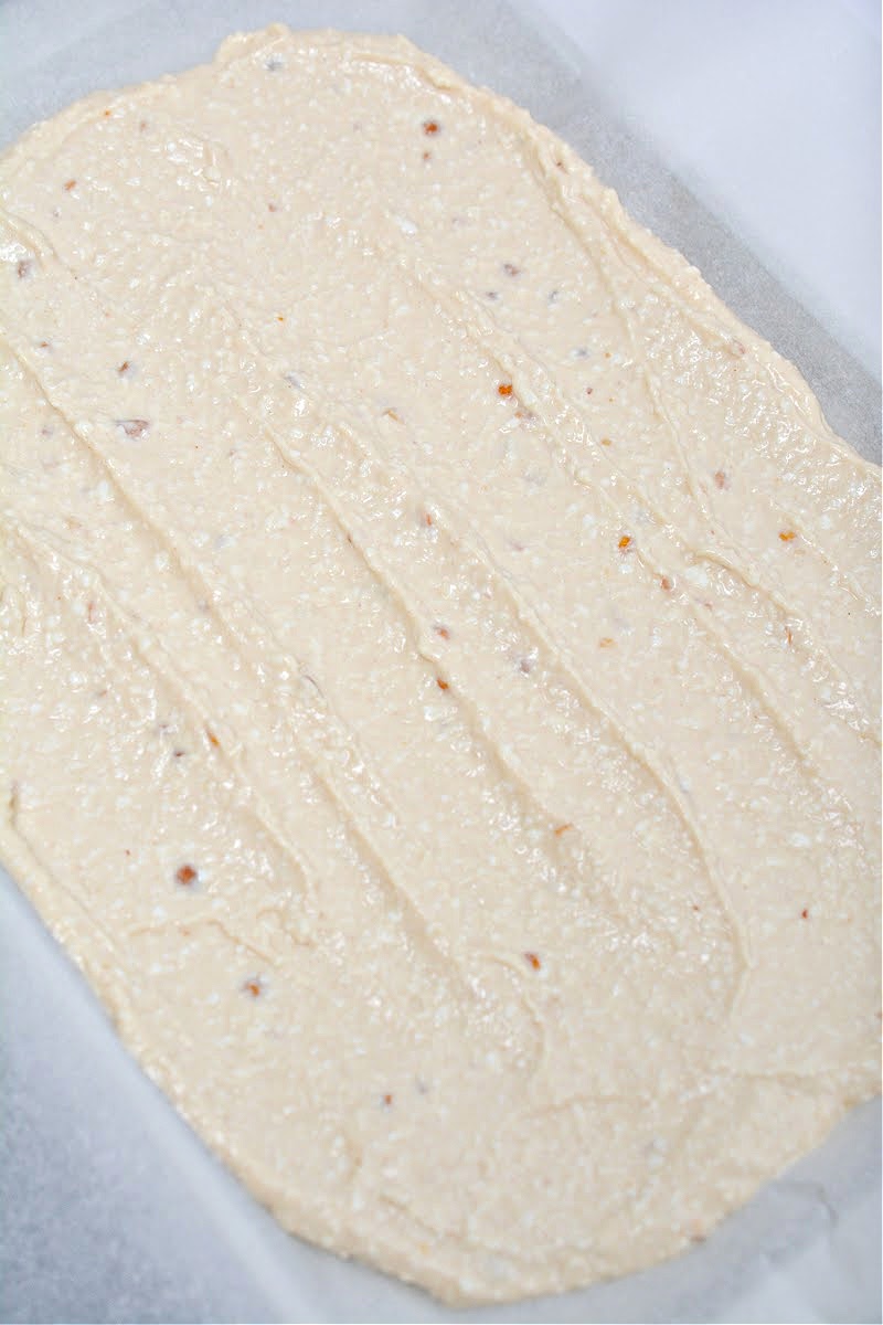 Keto Frozen Cottage Cheese Bark batter on a baking sheet
