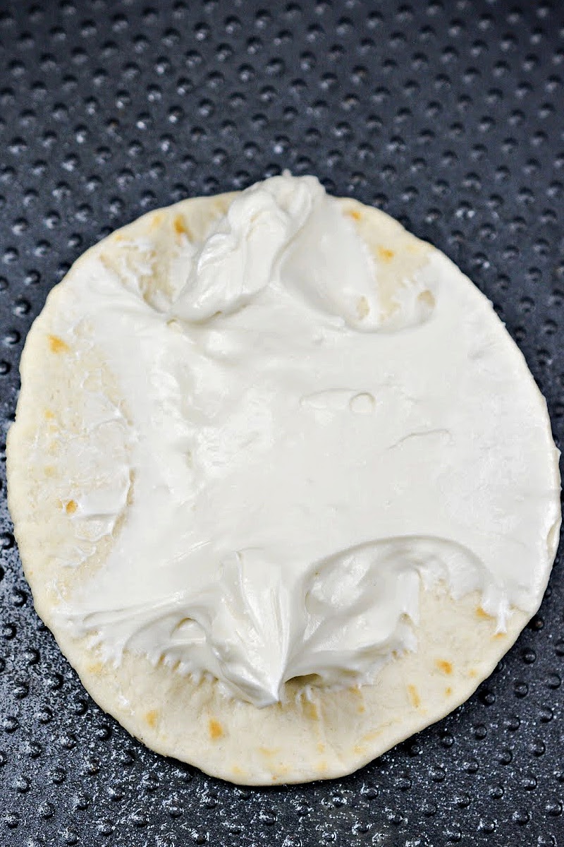 Spreading Cream Cheese on a Tortilla