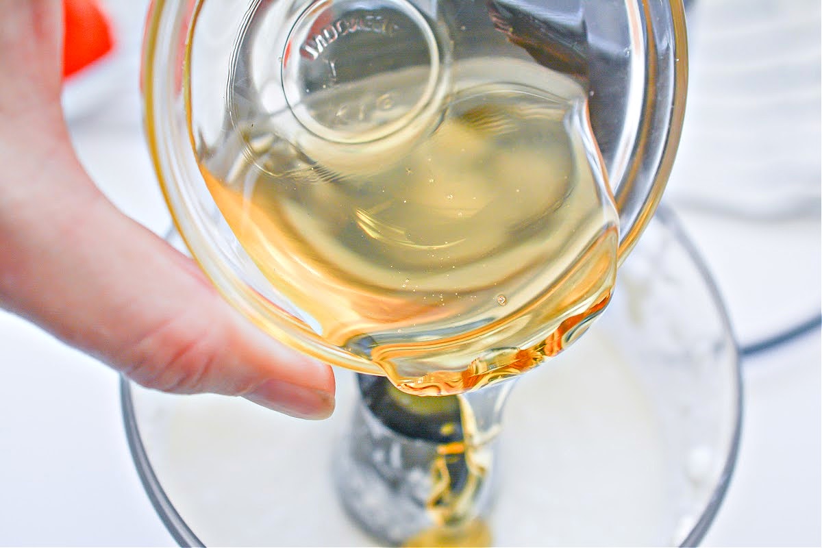Adding sugar free honey to the food processor