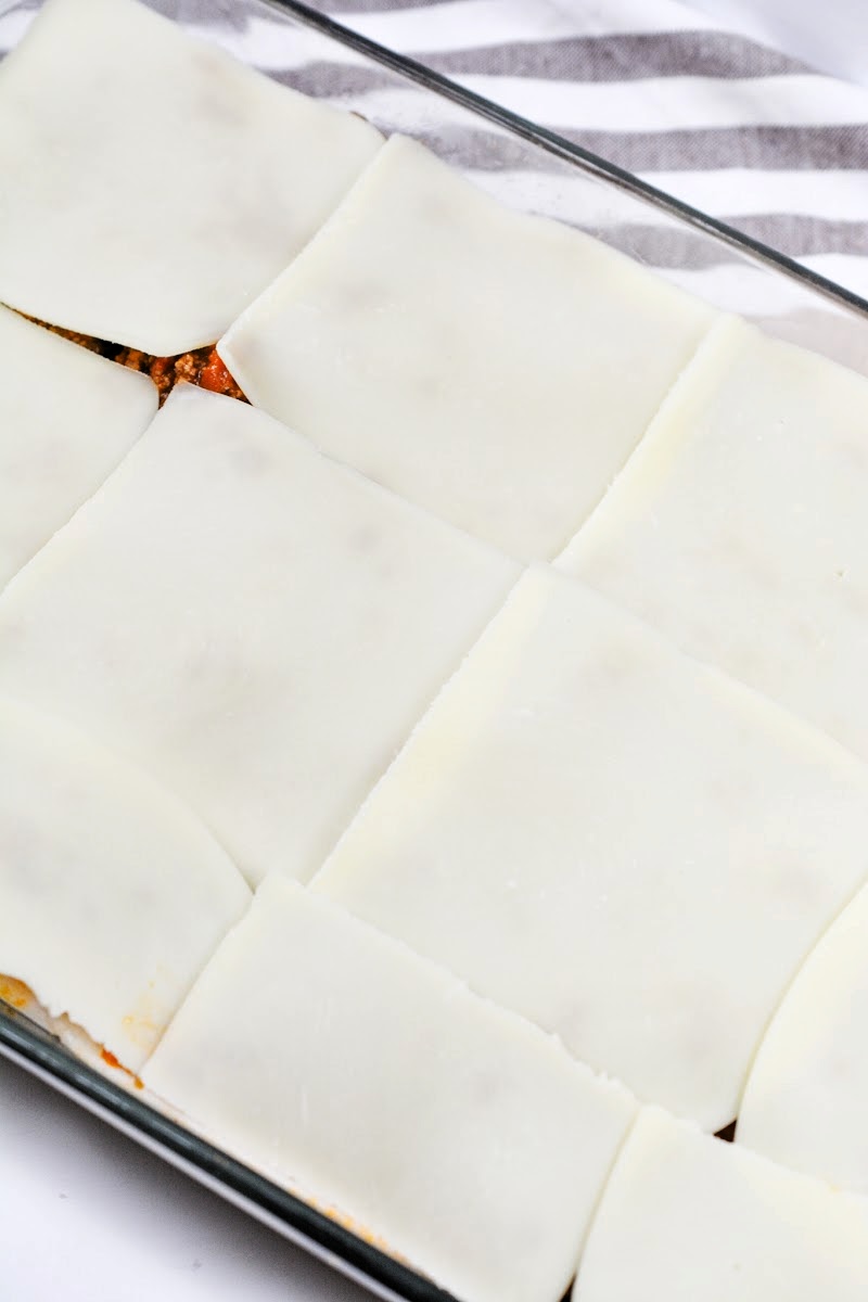Sliced mozzarella cheese on top of Keto Protein Lasagna