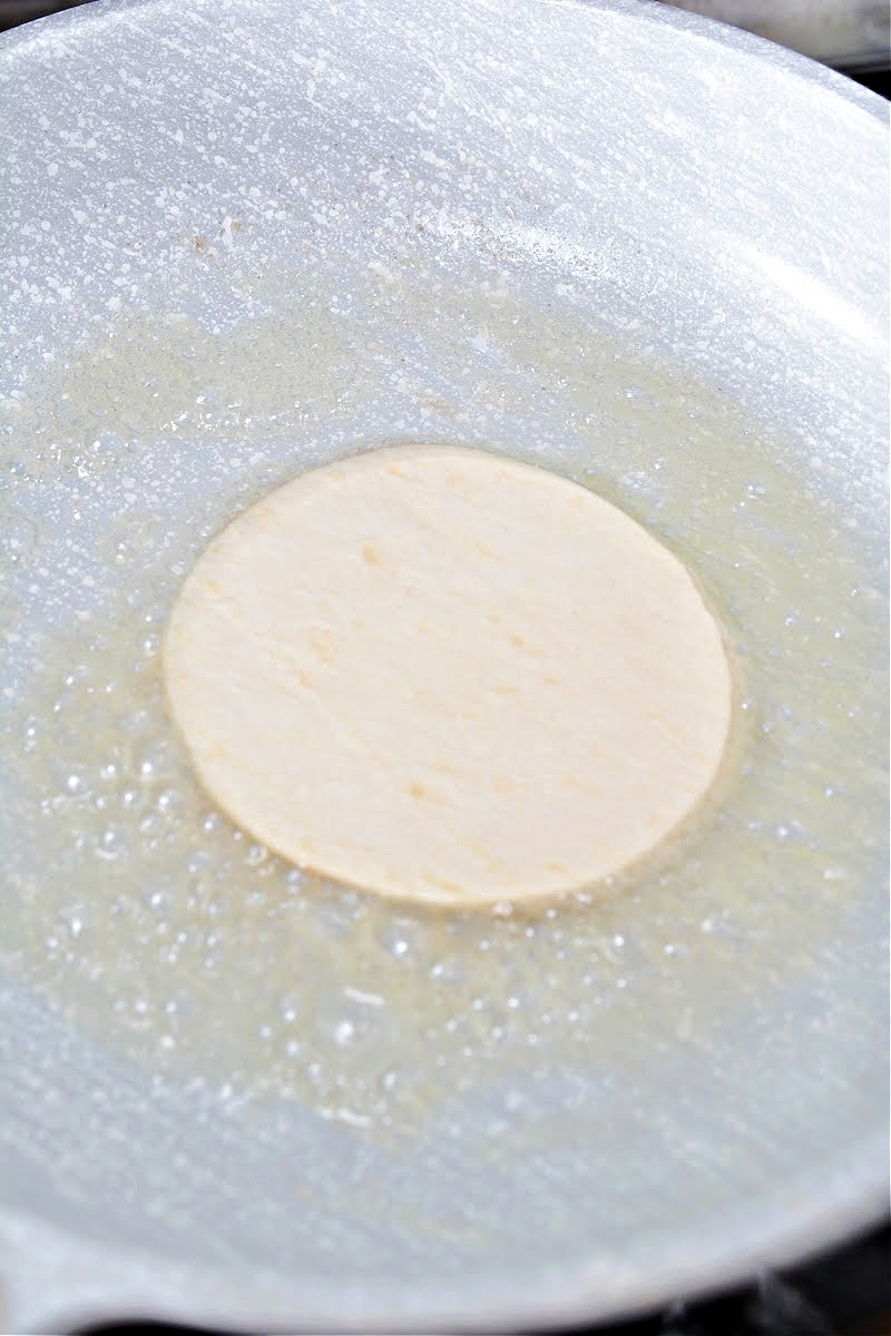 Frying keto tortillas in a skillet
