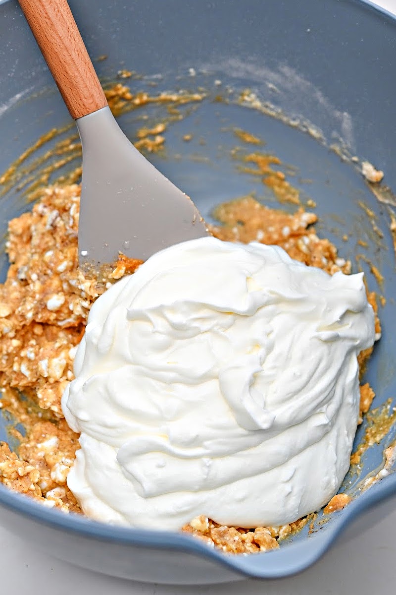 Adding whipped cream to the pumpkin mixture