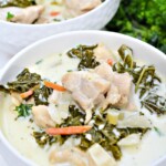 Two bowls of chicken stew with kale