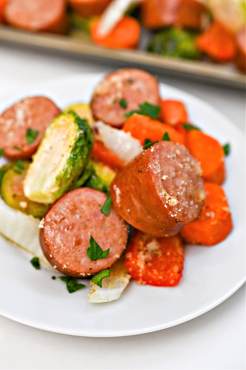A white plate of Low Carb Honey Garlic Sausage and Veggies