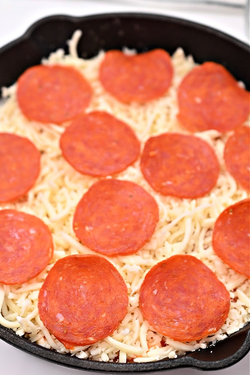 Adding pepperoni to the dip