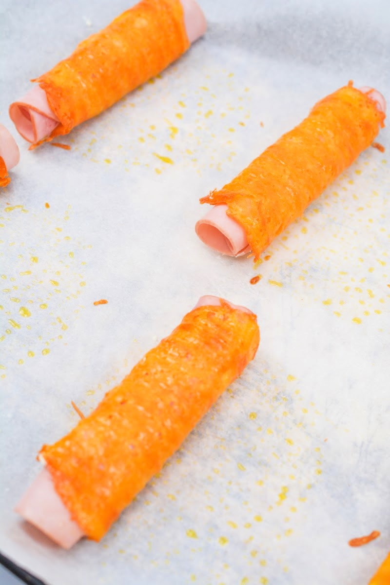 Ham rolled in cheddar cheese wraps