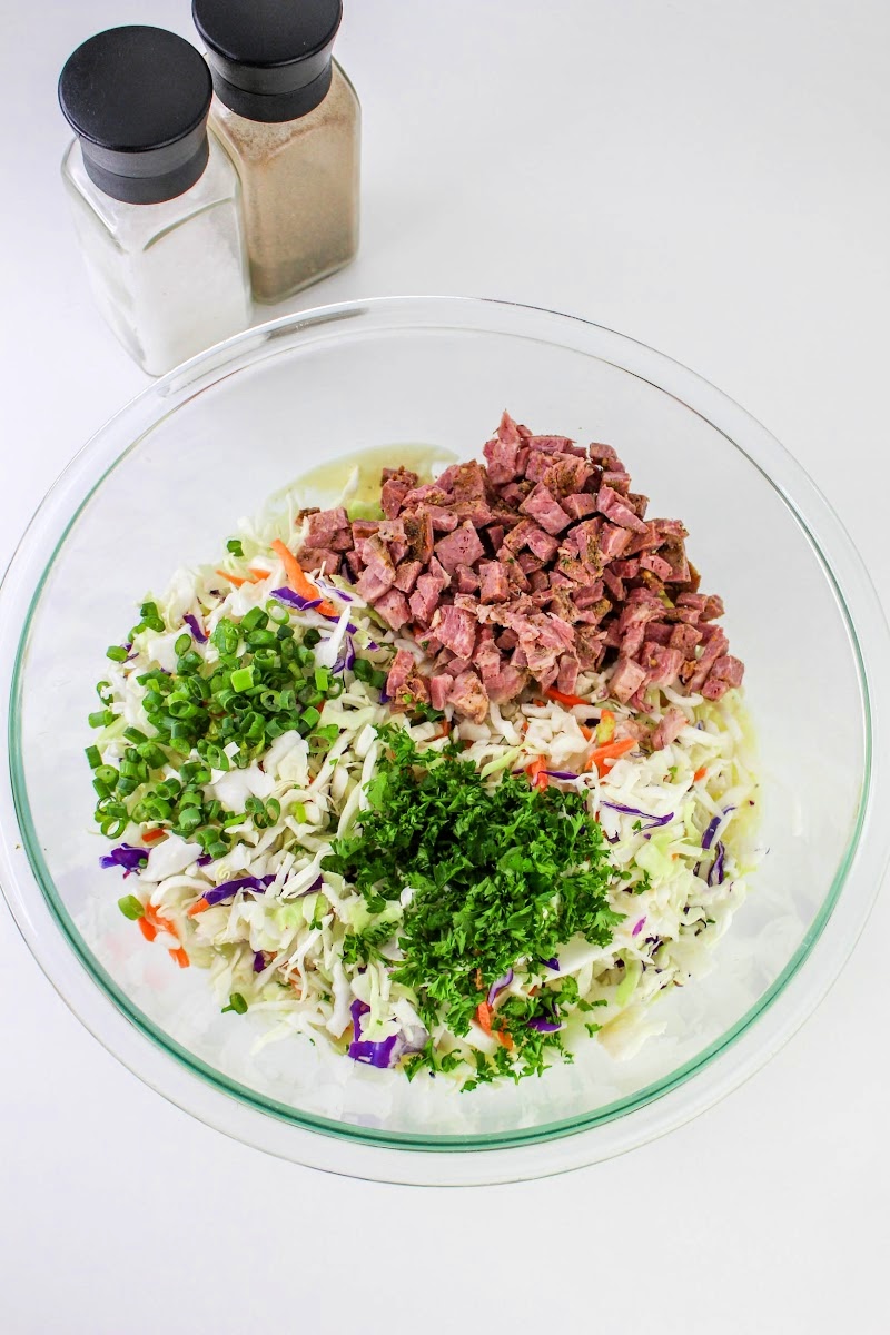 Mixing the Low Carb Corned Beef Slaw Ingredients in a bowl