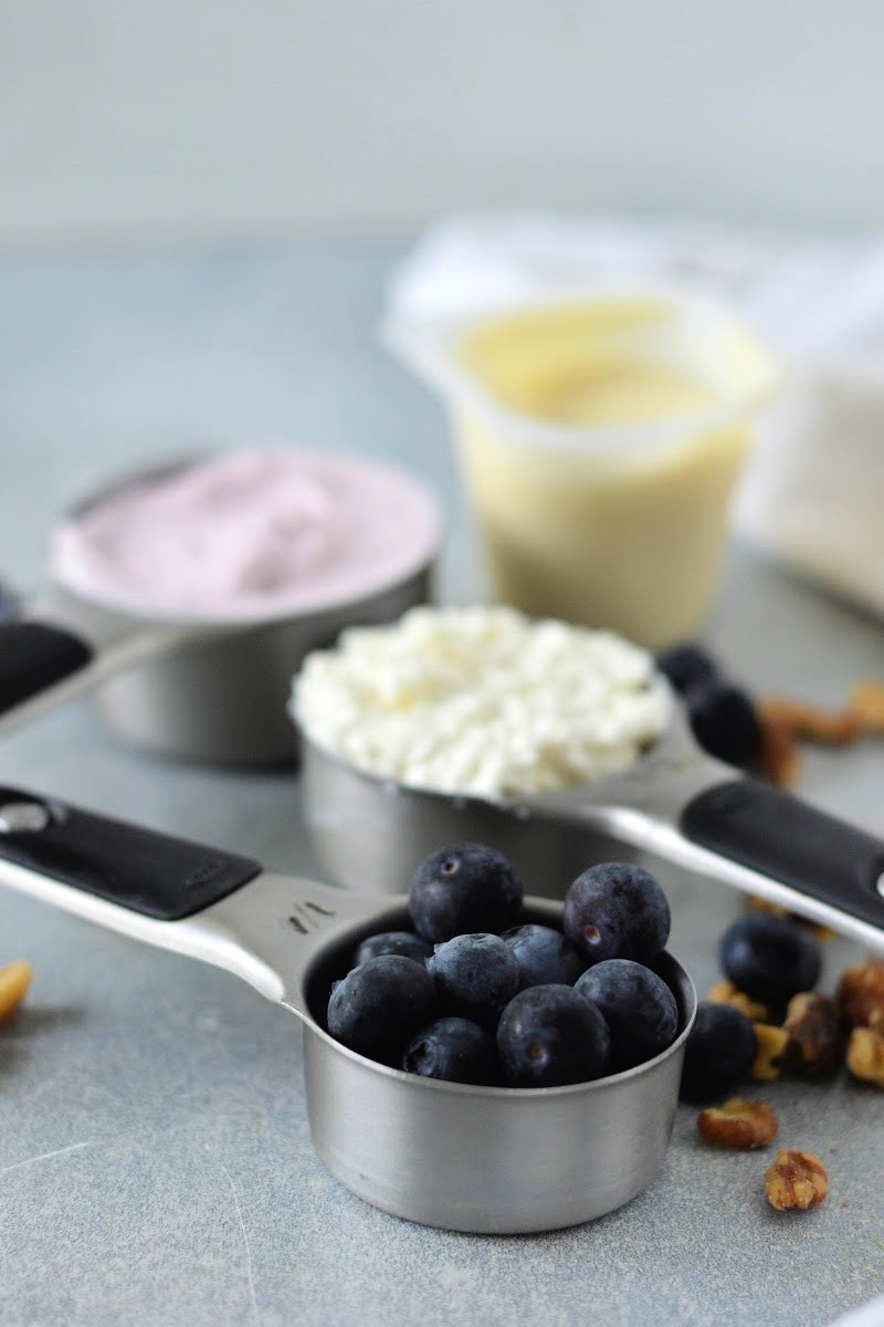 Blueberries, cottage cheese, yogurt, and pudding
