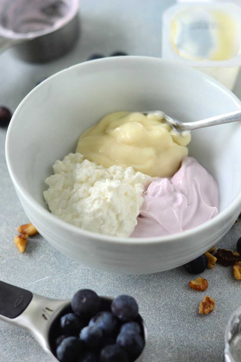 Mixing the pudding, yogurt, and cottage cheese together