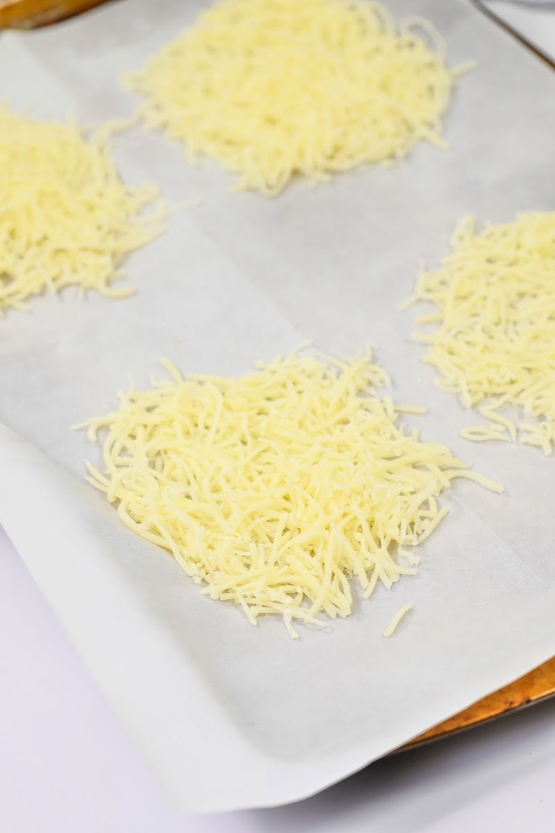 Shredded Swiss Cheese on a baking sheet