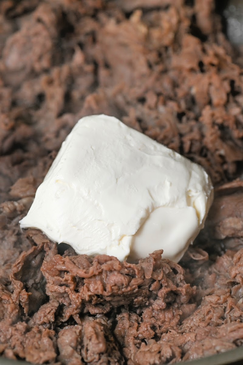 Cream cheese and sliced ribeye steak