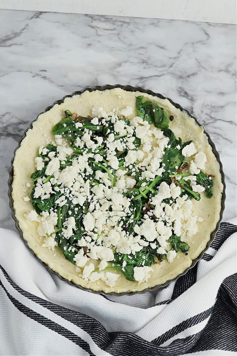 Adding feta cheese on top