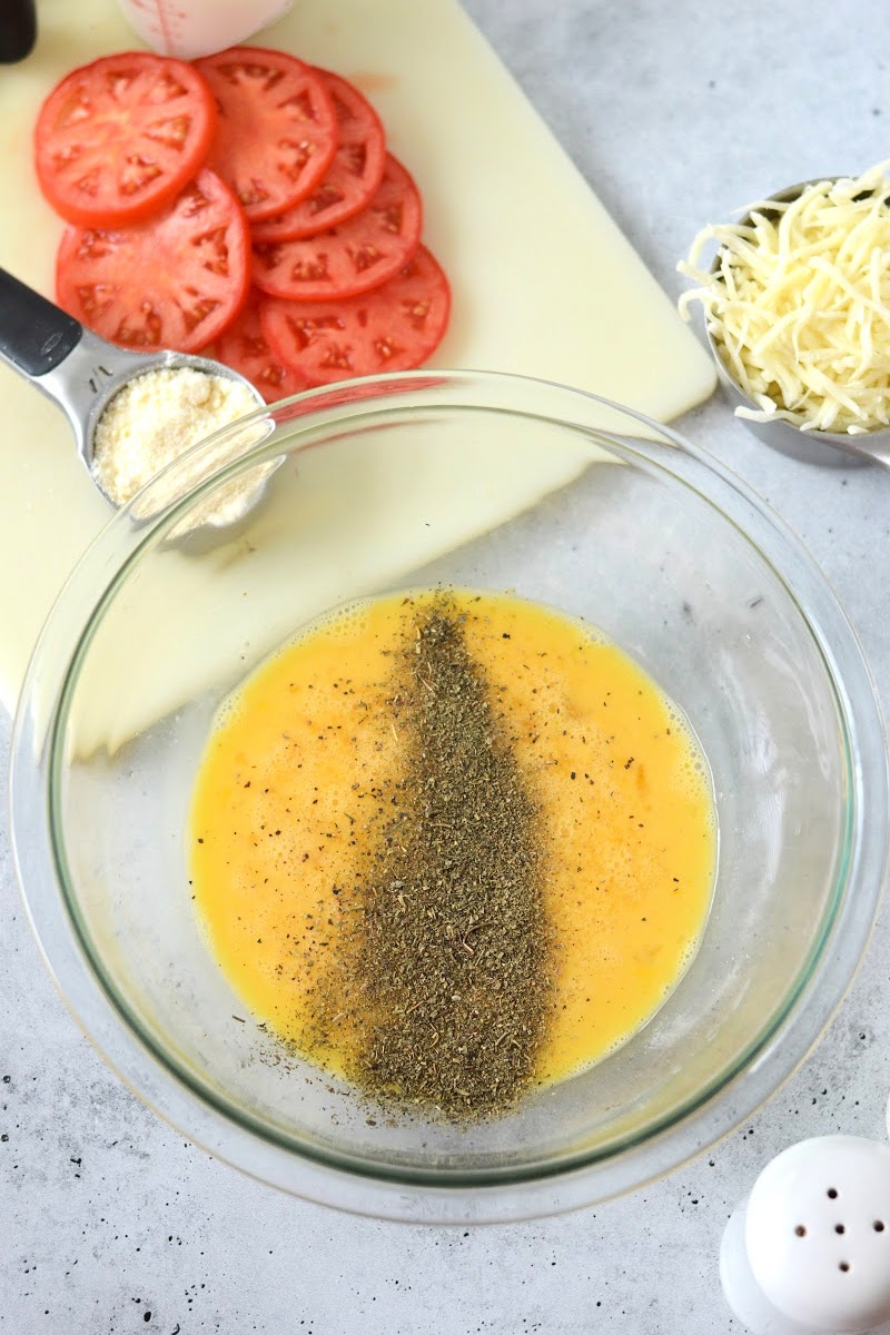 Adding spices to the raw eggs