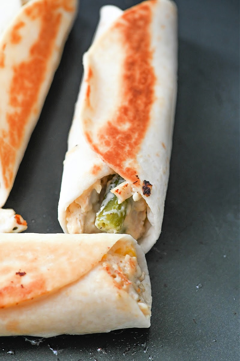 Low-Carb Crispy Chicken Pot Pie Roll-Ups in a skillet