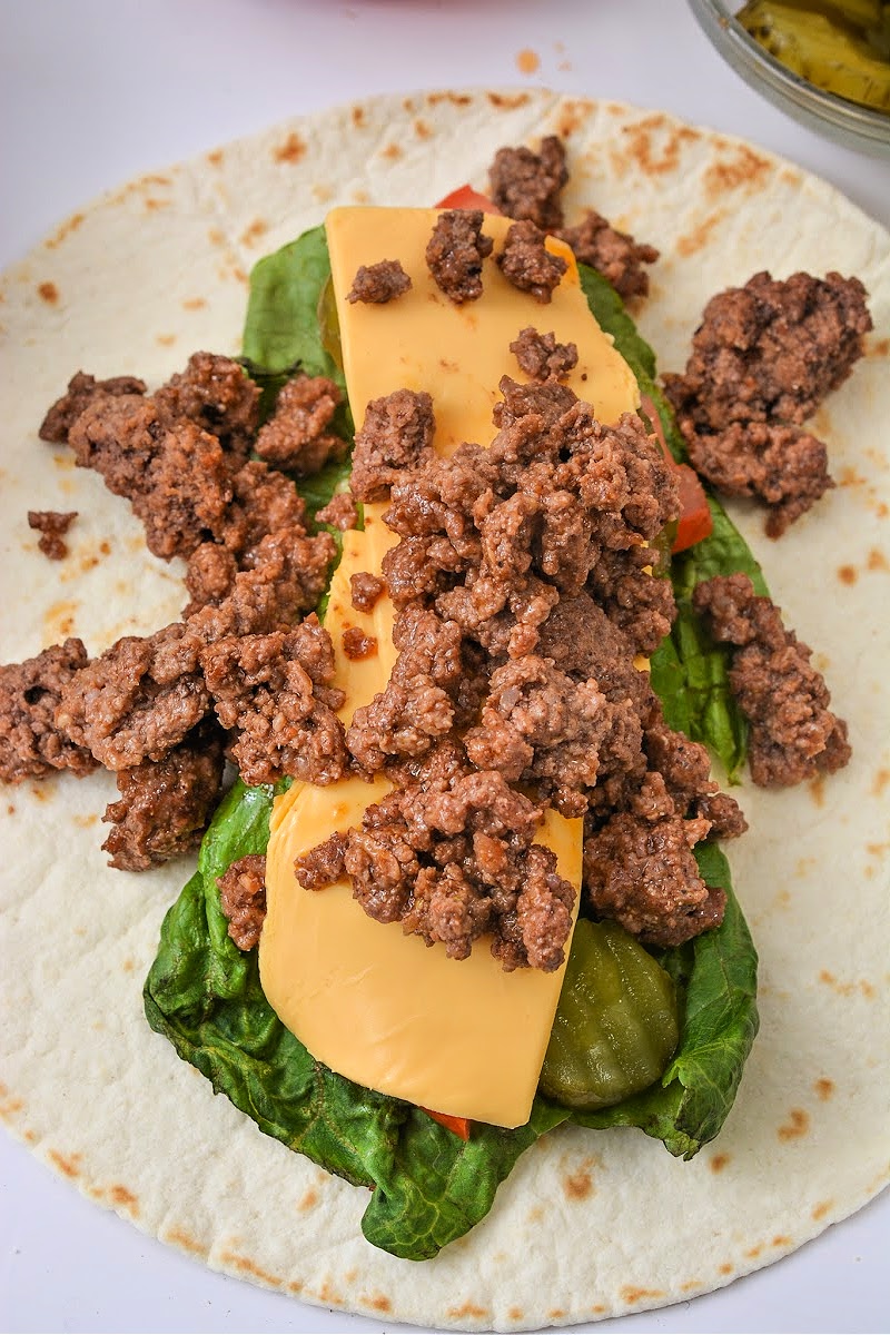 Adding ground beef on top