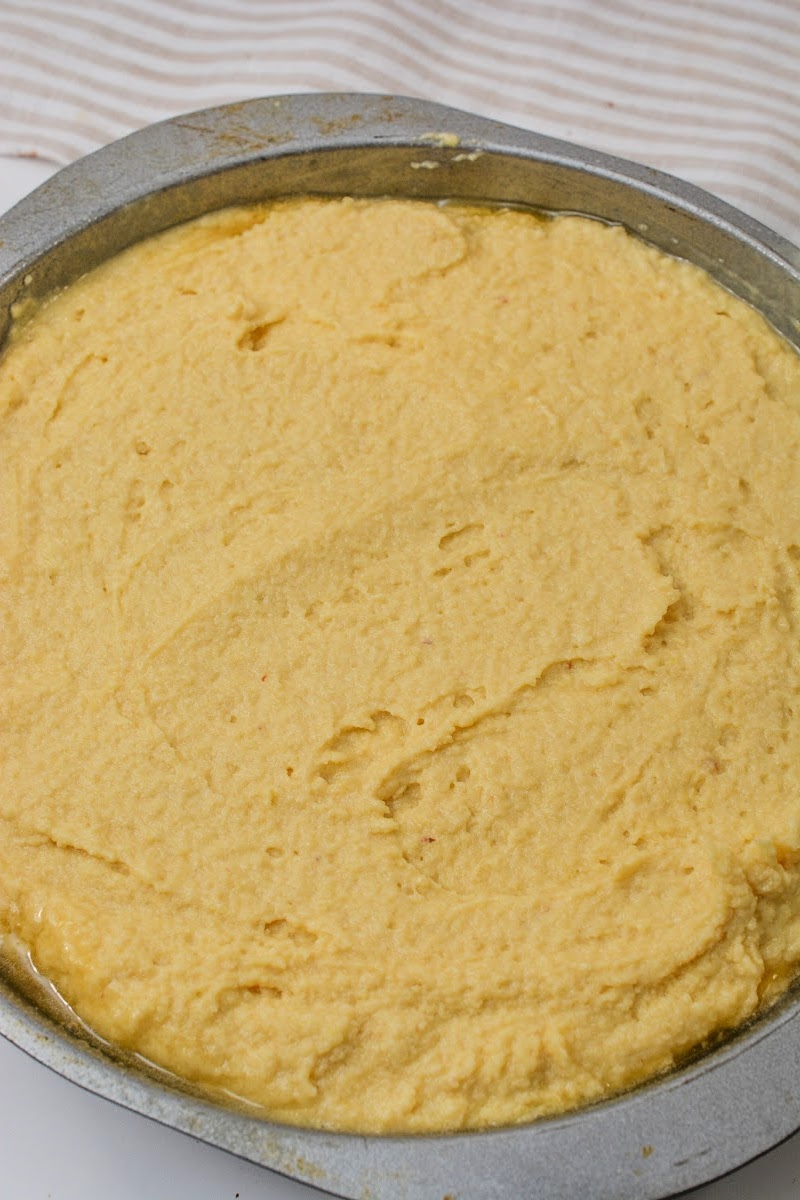 The batter in a cake pan