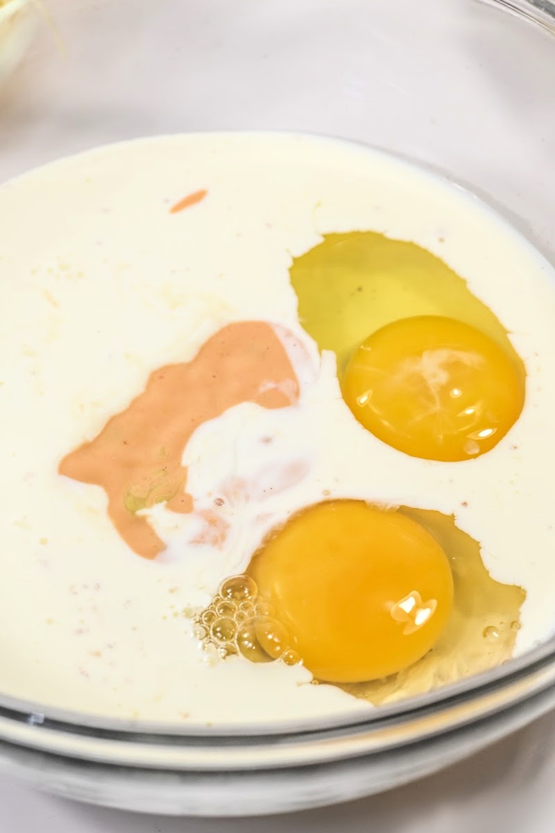 Mixing eggs with the heavy cream