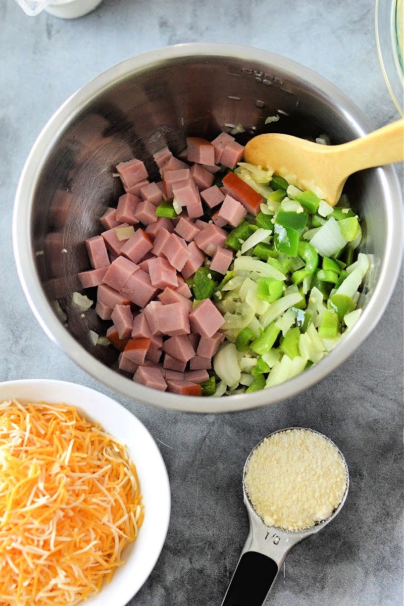 Mixing veggies and ham