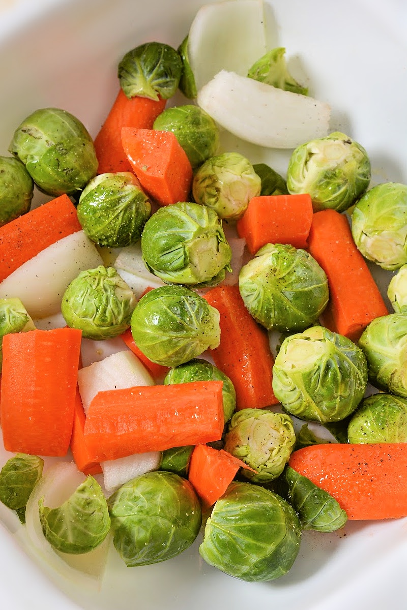 Placing veggies in the bottom of the casserole dish