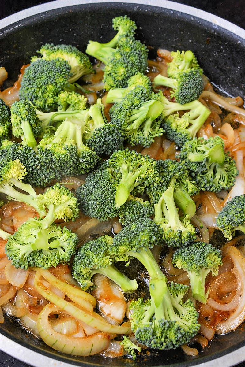 Adding Broccoli to the onions