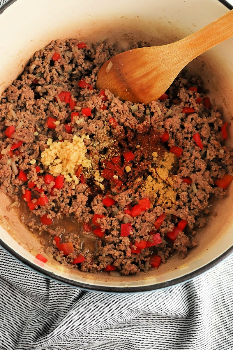 Adding garlic and spices