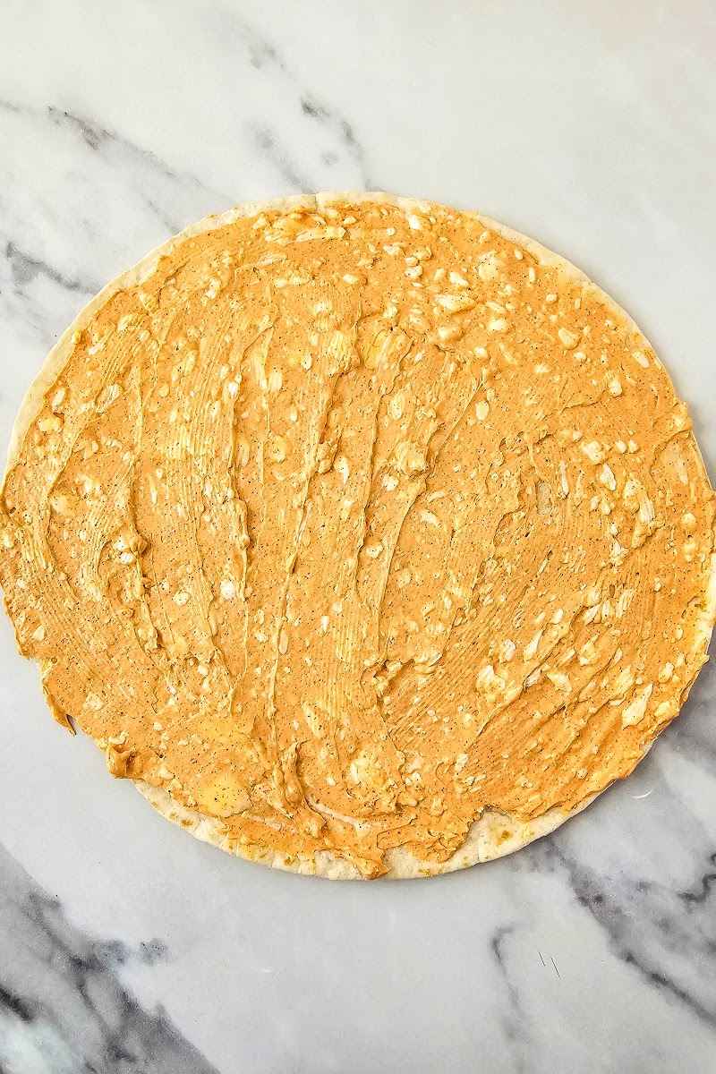 Adding cream cheese spread