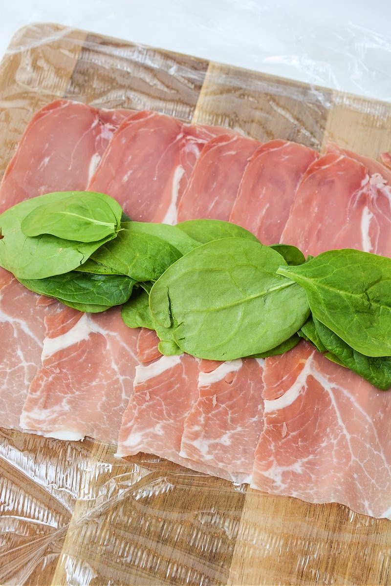 Adding fresh spinach leaves