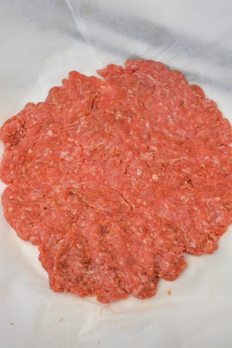 Spreading out ground beef into a thin layer
