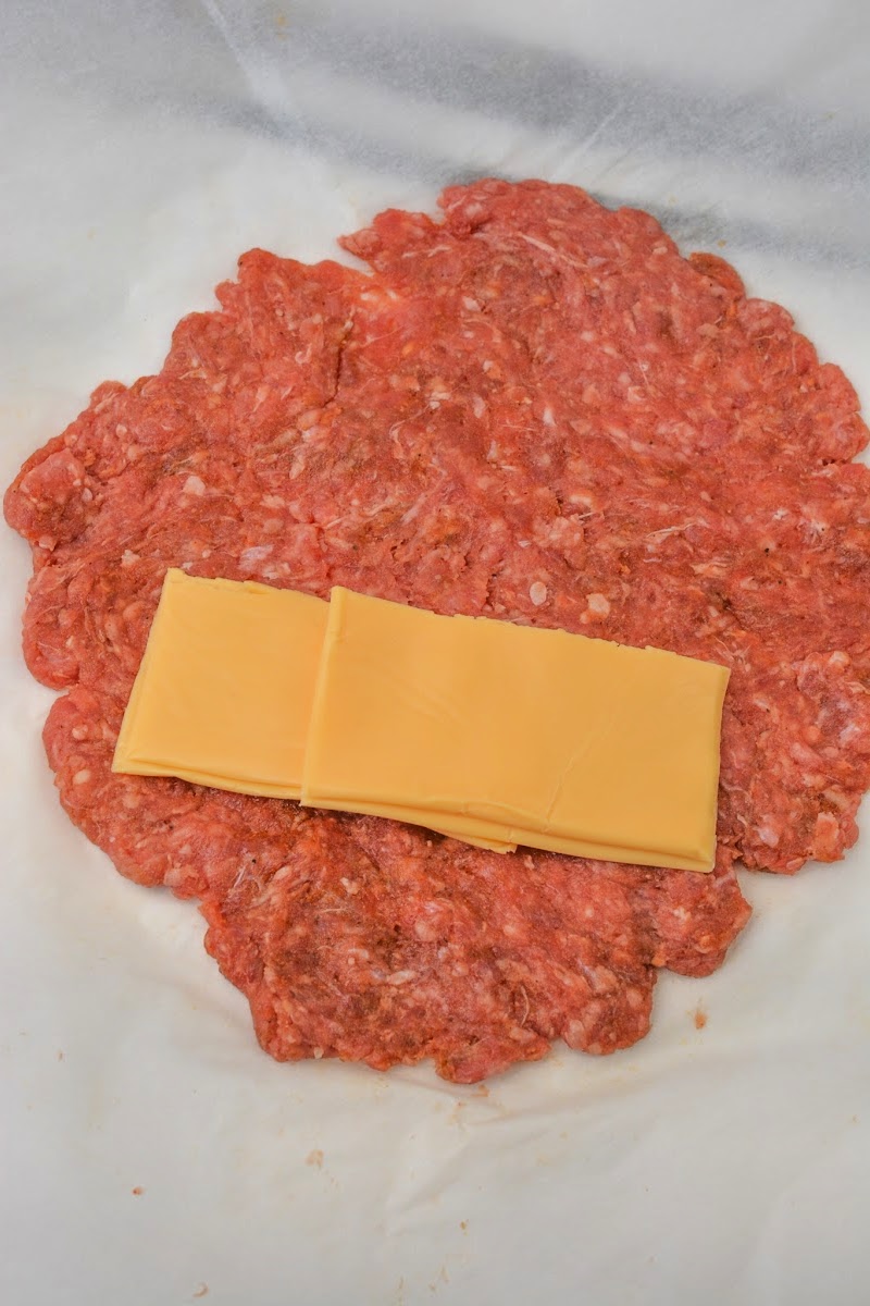 Adding cheese to the ground beef