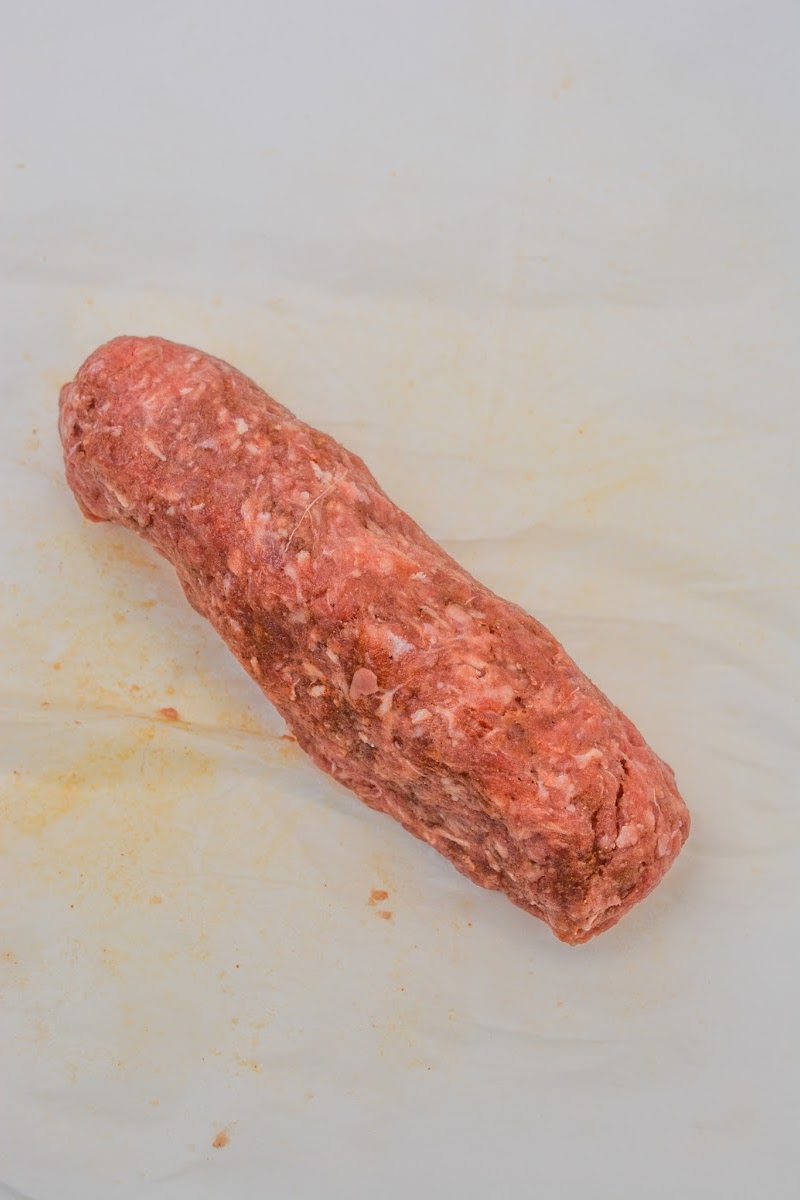 Raw cheeseburger dog