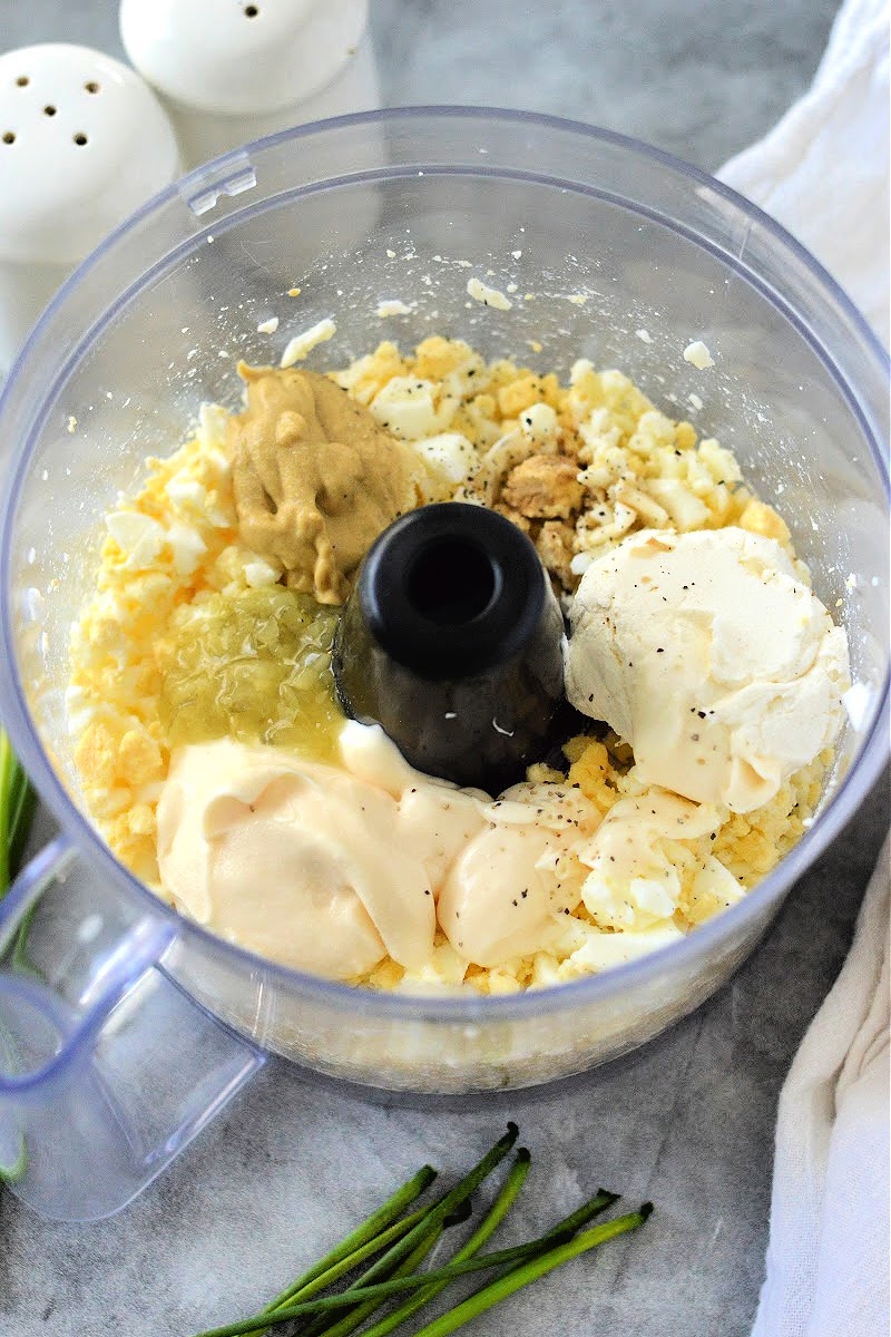 Adding ingredients to the food processor