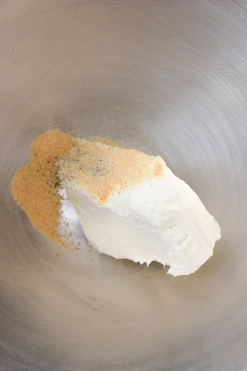 Mixing cream cheese with spices