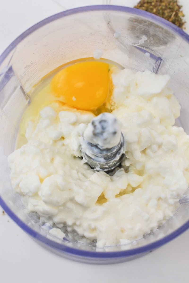 cottage cheese and an egg in a food processor