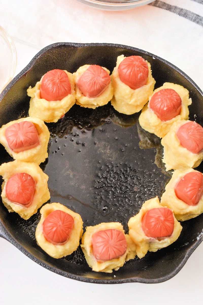 Adding hot dog bites to the skillet