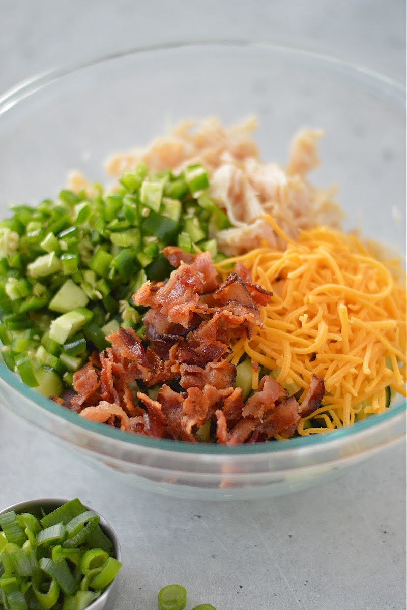 Mixing the salad ingredients in a bowl