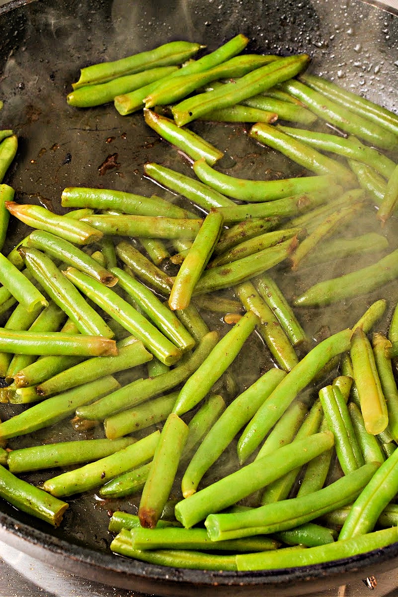 Sauteeing green beans in a skillet