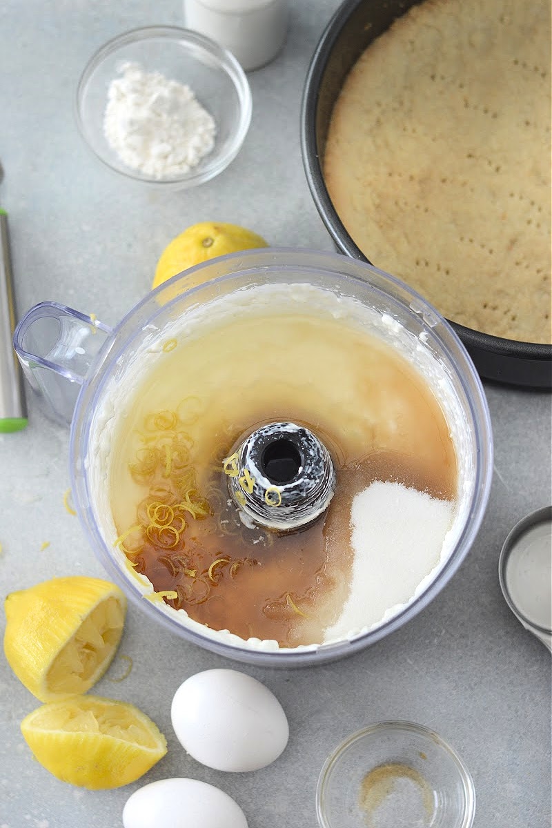 Mixing cheesecake filling in food processor