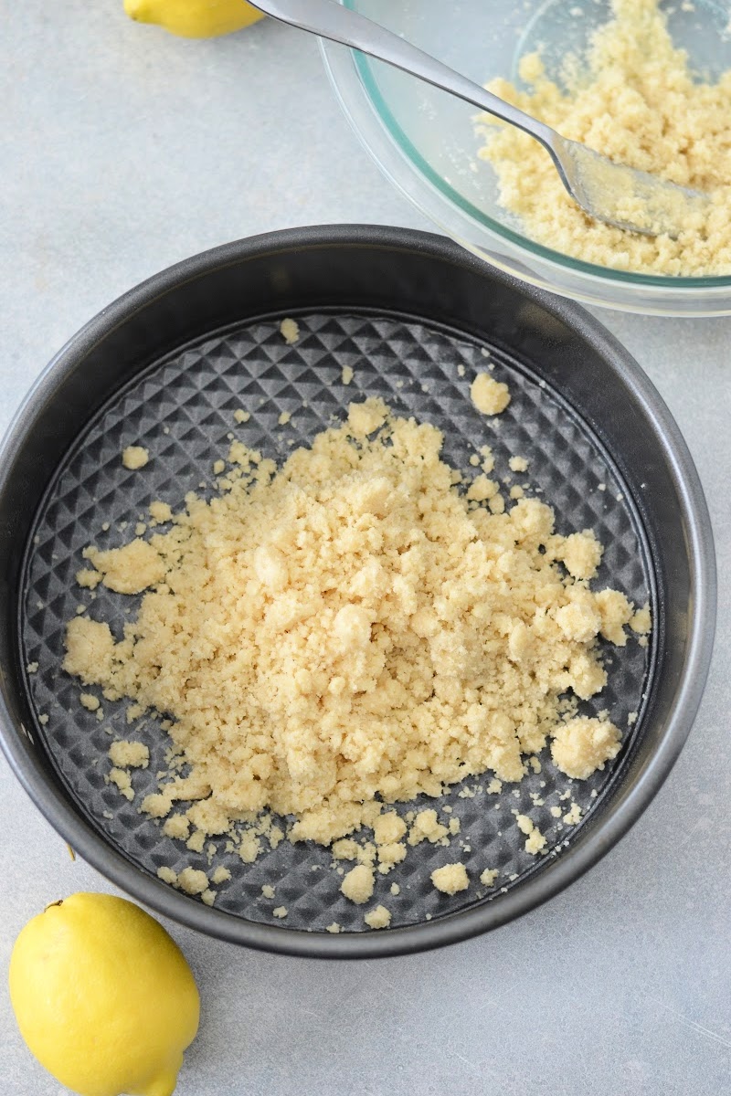 Spreading the crust in the bottom of the pan
