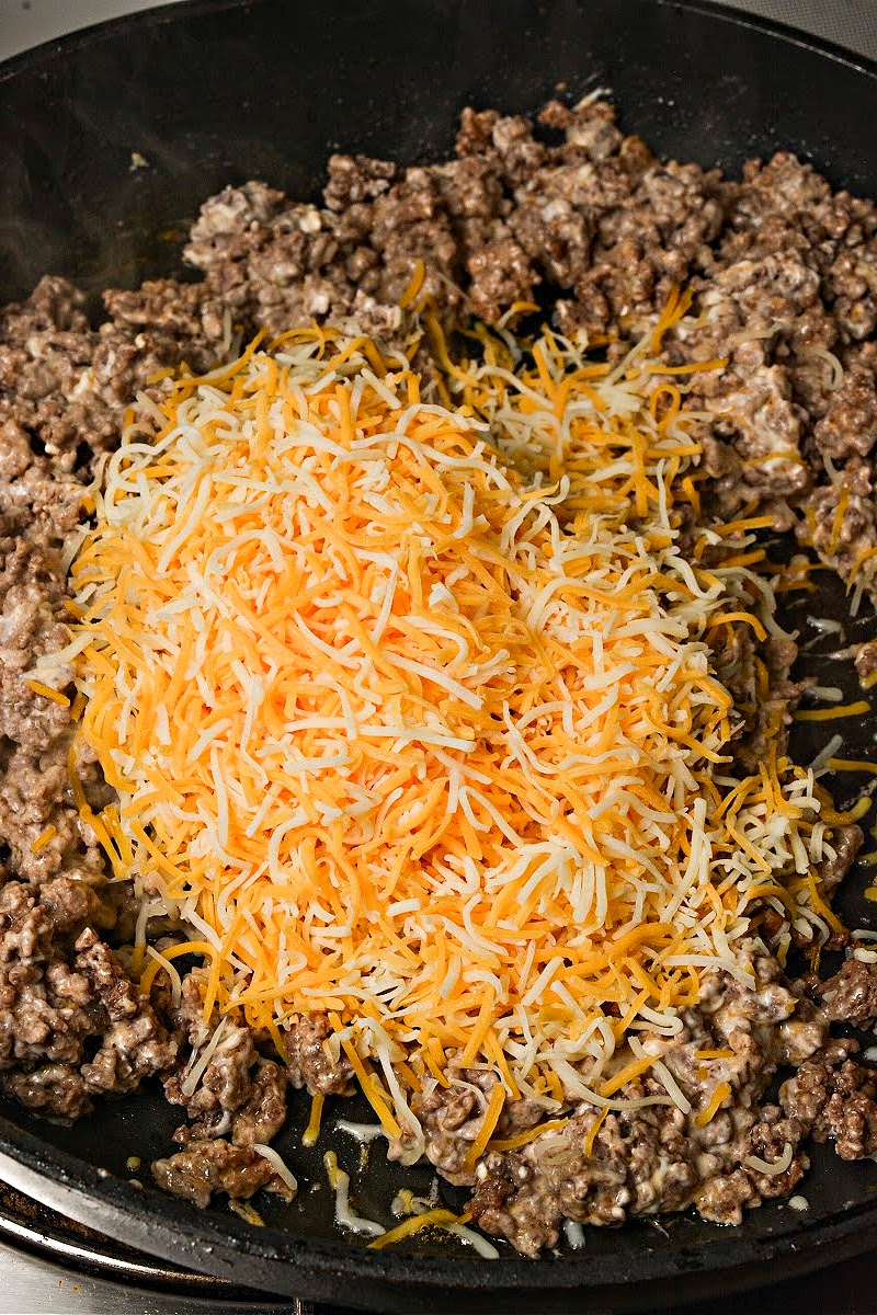 Adding cheese to the ground beef